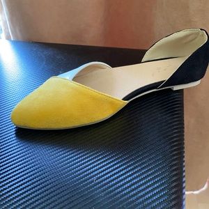 Yellow and navy blue flats